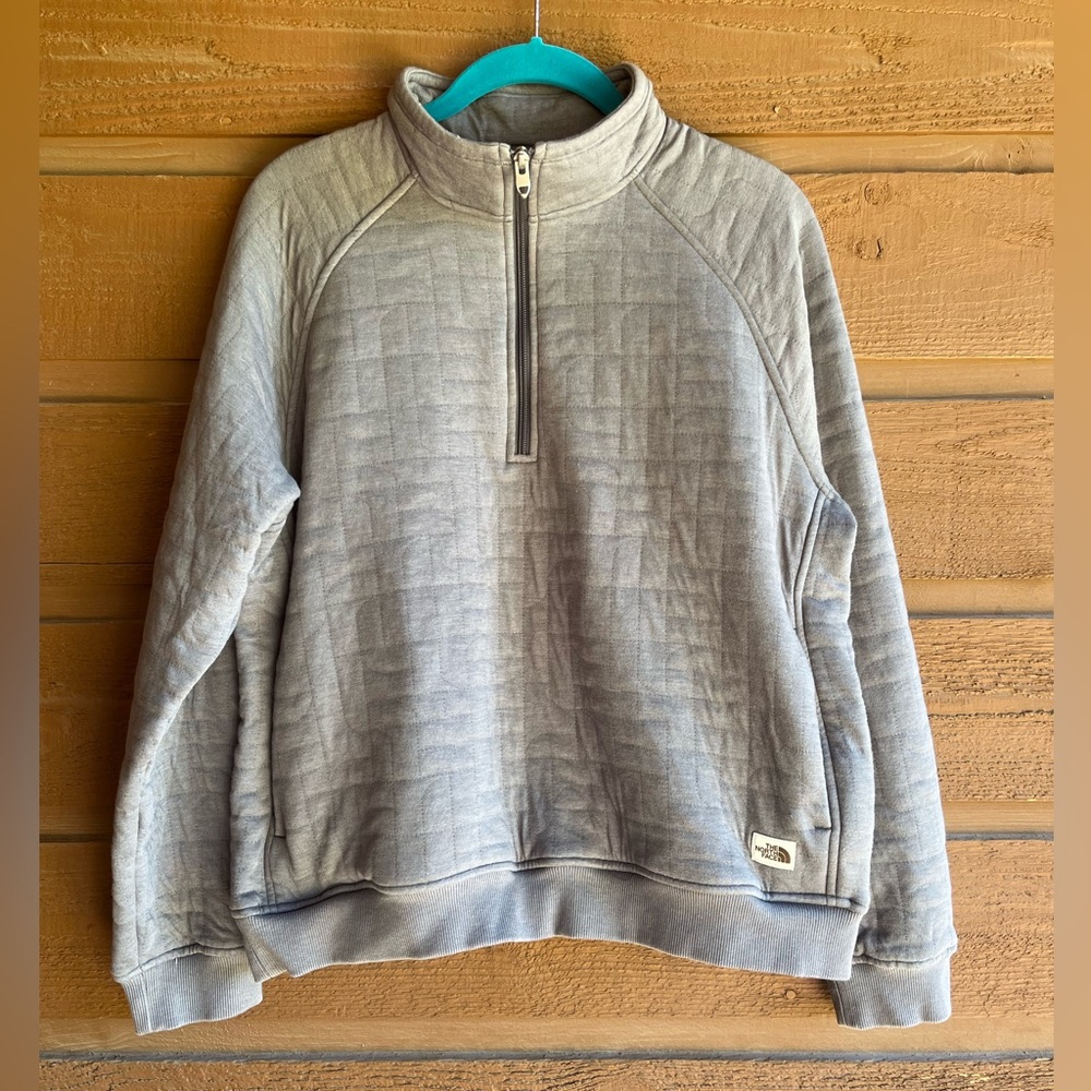 The North face quilted quarter zip mock neck pull over. Women’s size L. Grey
